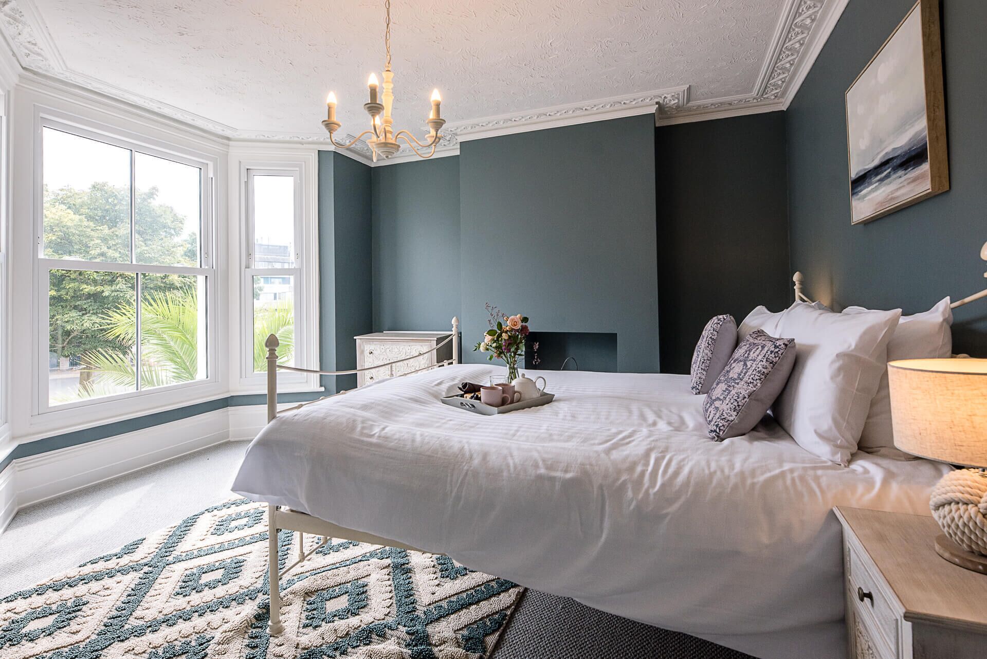 4 bedrooms, laptop workspace, iron/ironing board, bed sheets