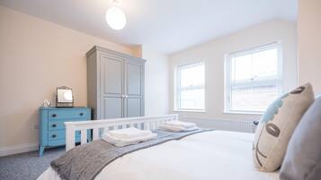 1 bedroom, laptop workspace, bed sheets