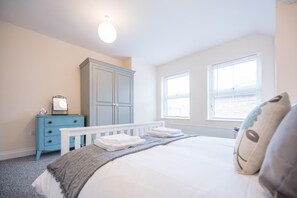 1 bedroom, laptop workspace, bed sheets