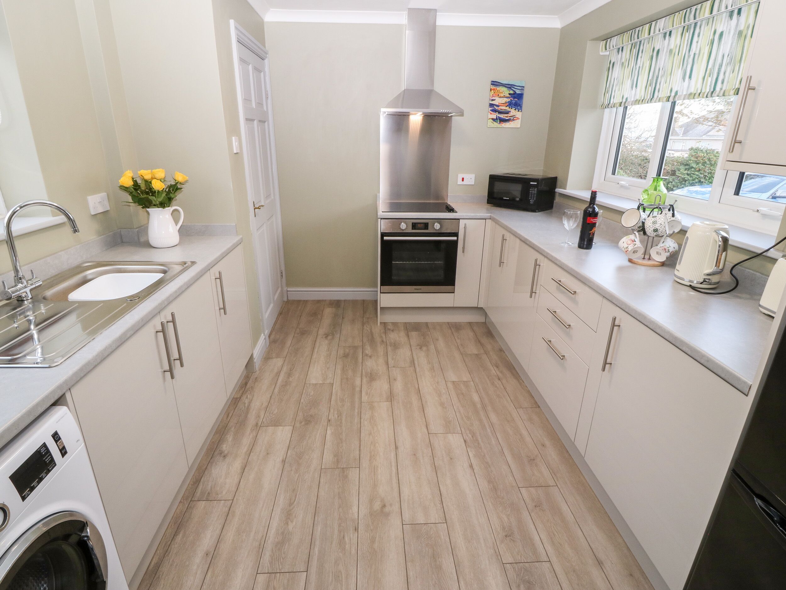 Fridge, electric kettle, toaster, cookware/dishes/utensils