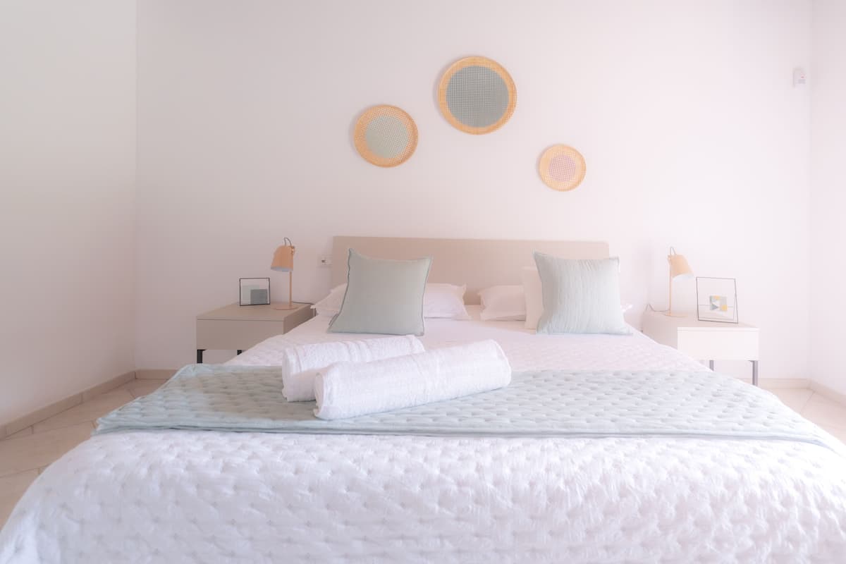 Premium bedding, memory-foam beds, minibar, desk