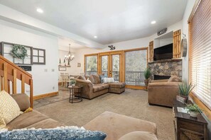 TV, fireplace, books, offices