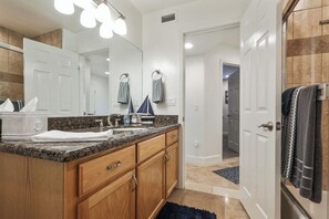Shower, hair dryer, towels