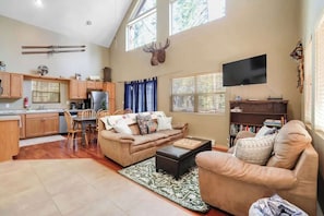 TV, fireplace, books, offices