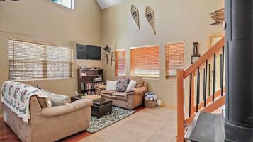 TV, fireplace, books, offices