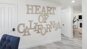 A room with a large wall sign reading "Heart of California."