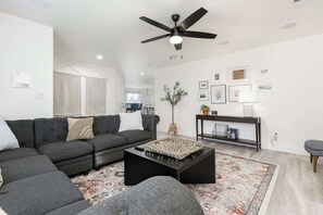 TV, fireplace, books, offices