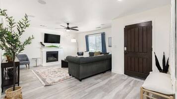 TV, fireplace, books, offices