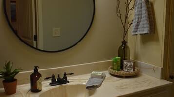 Combined shower/tub, hair dryer, towels, soap