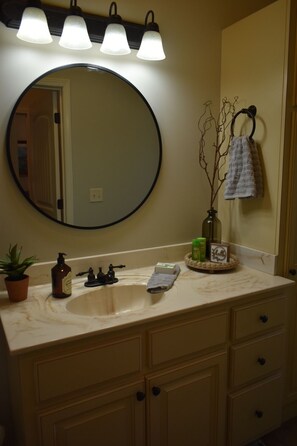 Combined shower/bathtub, hair dryer, towels, soap