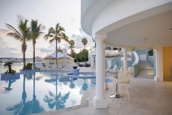 Relax poolside with shaded loungers and an easygoing bar nearby.