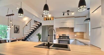 Magnifique chalet au bord de l'eau Ă Alma