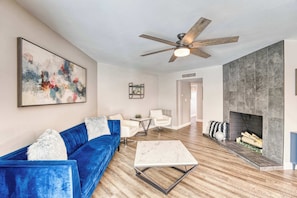 House, Multiple Beds, Pool Access, Garden View (Old Scottsdale Retreat) | Living area | 42-inch flat-screen TV with digital channels, fireplace