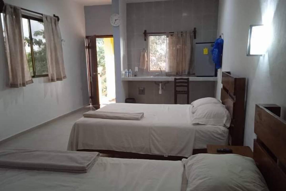 Family Room | Minibar, WiFi (free), bed sheets
