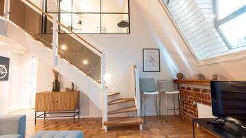 Exclusive Apartment | Living area | 36-inch flat-screen TV with cable channels, TV
