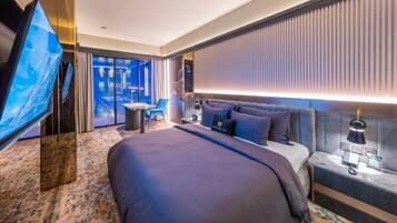 Premium bedding, free minibar items, in-room safe, desk