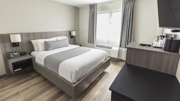 Premium bedding, down duvets, pillow-top beds, in-room safe