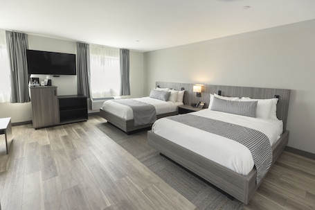 Premium bedding, down comforters, pillowtop beds, in-room safe. The Farmstead Hotel