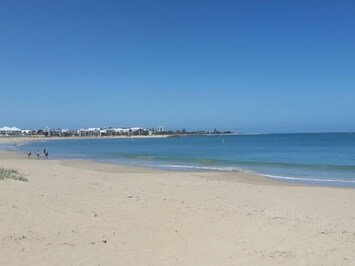 Beach at end of the street. 2 min walk