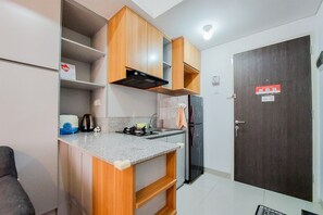 Apartment, 1 Bedroom | Private kitchen - Comfort And Cozy Style 1Br At Serpong Garden Apartment (Cisauk)