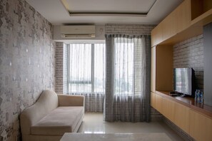 Apartment, 2 Bedrooms | Living area | TV