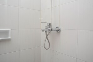Studio | Bathroom | Shower, free toiletries, towels - Homey Living Studio At Signature Park Grande Apartment (Jakarta)