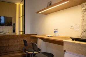 Living area - Modern And Classic 1Br At Evenciio Apartment (Depok)