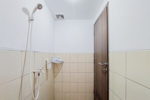 Studio | Bathroom | Shower, free toiletries, towels - Warm And Simply Studio Room At Urbantown Serpong Apartment (South Tangerang)