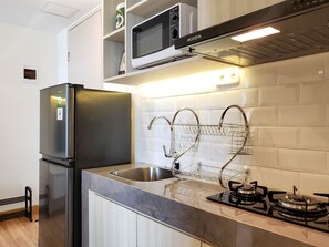 Apartemen, 2 kamar tidur | Dapur pribadi | Lemari es, kompor, peralatan masak/sendok-piring, dan meja makan