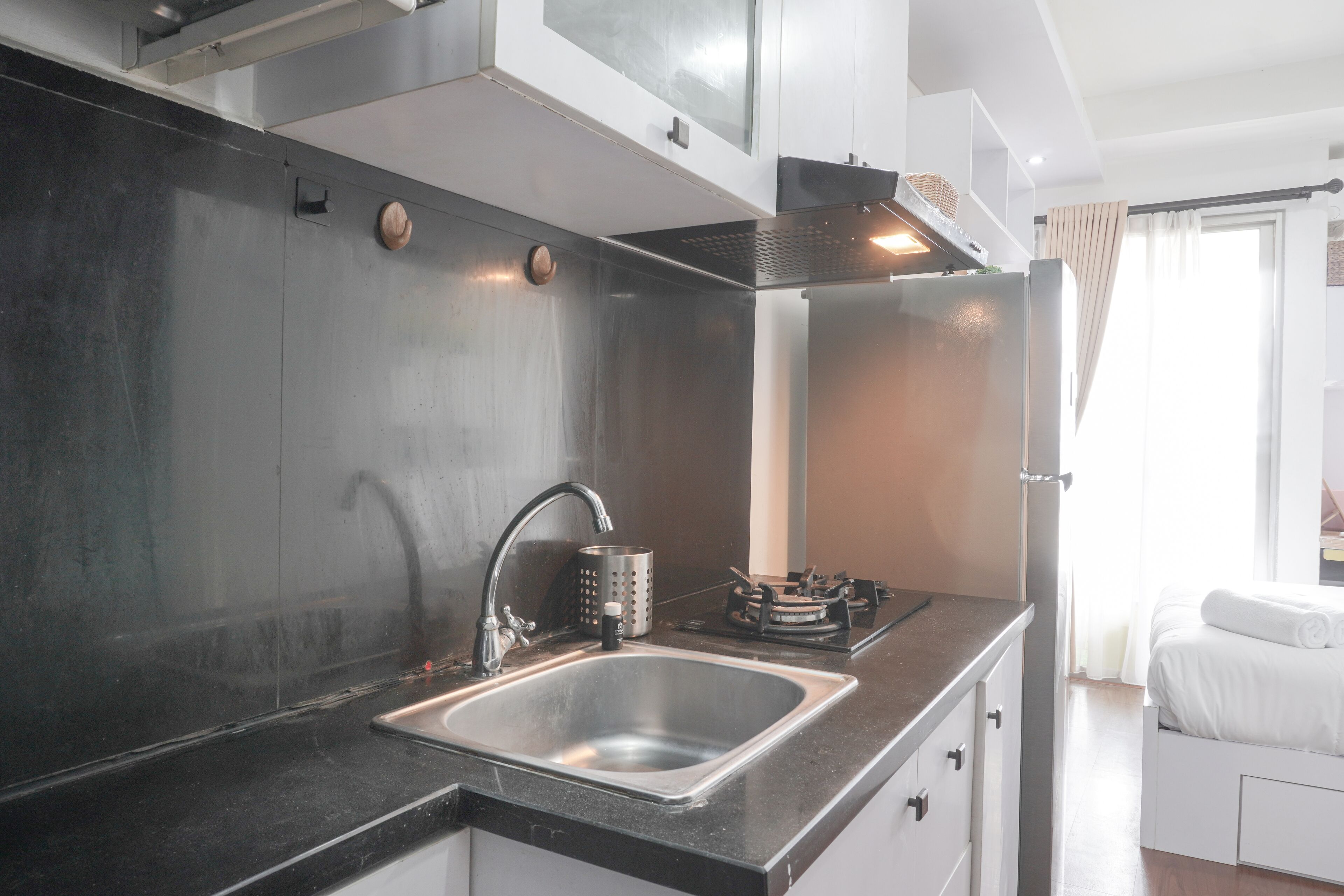 Studio | Private kitchen | Fridge, stovetop, cookware/dishes/utensils, dining tables