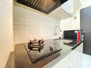 Private kitchen - Comfy Studio Room At Grand Asia Afrika Apartment (Bandung)