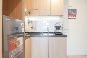 Apartment, 2 Bedrooms | Private kitchen | Fridge, stovetop, cookware/dishes/utensils, dining tables - Cozy And Simply Look 2Br Apartment At M-Town Residence (Gading Serpong)
