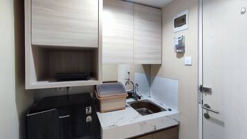 Departamento, 1 habitación | Cocina privada | Refrigerador, parrilla de estufa, utensilios de cocina y comedor