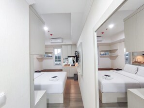 Individually decorated, individually furnished, free WiFi - Warm And Cozy Style Studio Room At Paltrow City Apartment (Semarang)