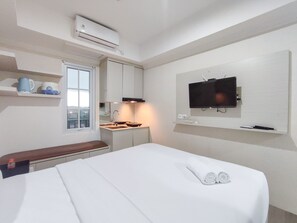 Individually decorated, individually furnished, free WiFi - Warm And Cozy Style Studio Room At Paltrow City Apartment (Semarang)