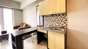 Apartemen, 2 kamar tidur | Dapur pribadi | Lemari es, kompor, peralatan masak/sendok-piring, dan meja makan