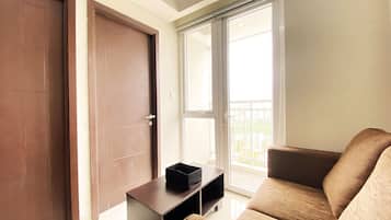 Apartment, 2 Bedrooms | Living area | TV