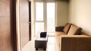 Apartemen, 2 kamar tidur | Area keluarga | TV