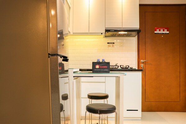 Apartamento, 2 quartos | Opções para refeição no quarto