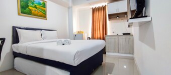 Comfort And Well Design Studio At Paltrow City Apartment