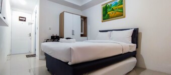 Comfort And Well Design Studio At Paltrow City Apartment
