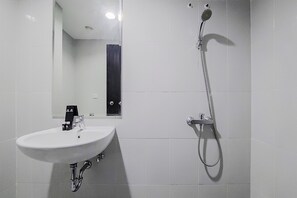 Studio | Bathroom | Shower, free toiletries, towels - Warm And Cozy Stay Studio At Casa De Parco Apartment (South Tangerang)