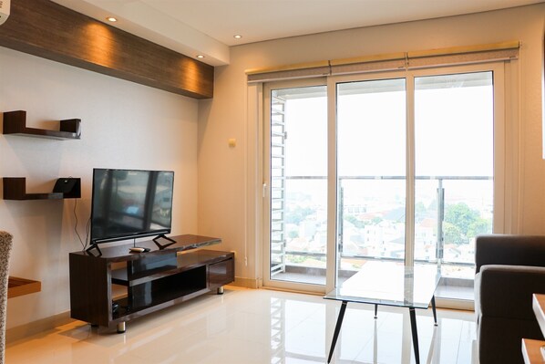 Apartment, 2 Bedrooms | Living area | TV - Nice 2Br Apartment At Maqna Residence (Jakarta)
