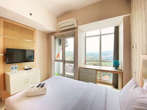 Studio | Individually decorated, individually furnished, free WiFi - Comfortable And Strategic Studio At Taman Melati Jatinangor Apartment (Hegarmanah)