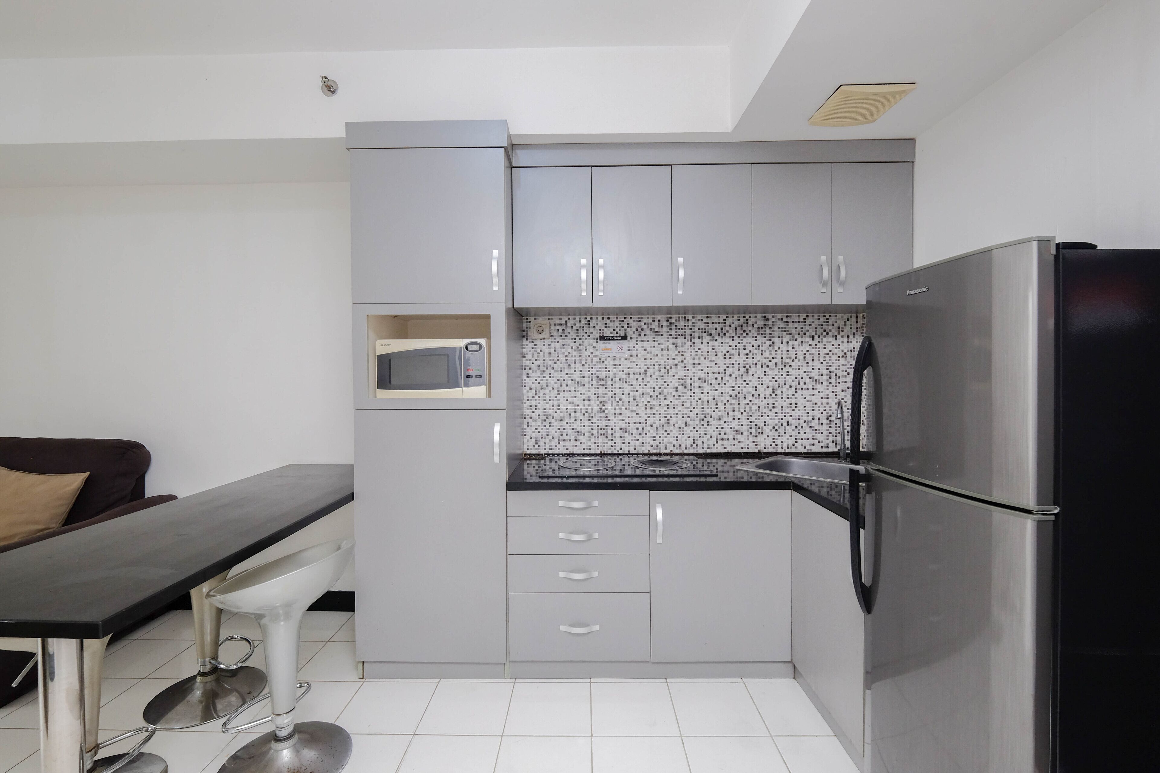 Apartment, 1 Bedroom | Private kitchen | Fridge, stovetop, cookware/dishes/utensils, dining tables