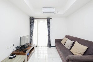 Apartment, 1 Schlafzimmer | Wohnbereich | Fernseher