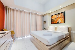 Individually decorated, individually furnished, free WiFi - Simple And Homey Studio Apartment At Casa De Parco (Pagedangan)