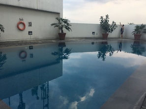 Outdoor pool - Cozy Stay And Serene Designed 2Br At Braga City Walk Apartment (Bandung)