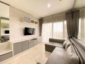 Living area - Cozy Stay And Serene Designed 2Br At Braga City Walk Apartment (Bandung)