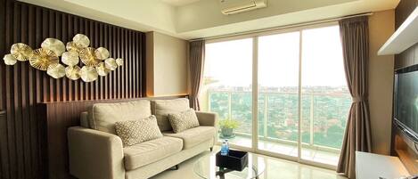 Apartment, 2 Bedrooms | Living area | TV